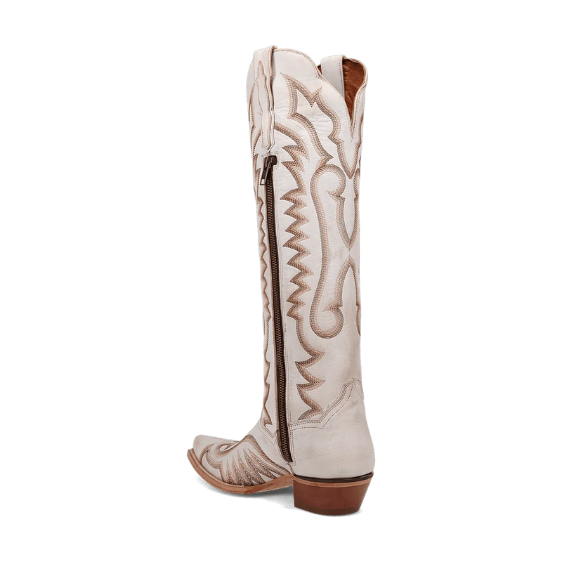 Dan Post Josie women's tall boots. White leather, snip toe, and intricate stitched patterns. Features a back zipper for easy wear. Medium brown heel.
