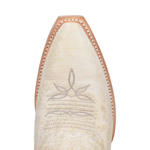 Dan Post Miley snip toe boots. Women's leather boots with bone-colored upper. Textured surface, light stitching, and floral toe embossing. Light tan leather welt.
