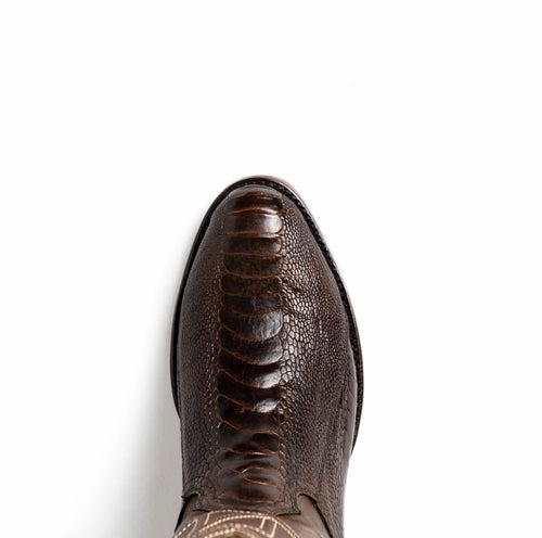 Marco Di Milano Denver boots: Brown ostrich leg upper with a round toe. Features a distinct scale pattern, raised toe cap, and seamless construction. Neatly stitched edges.
