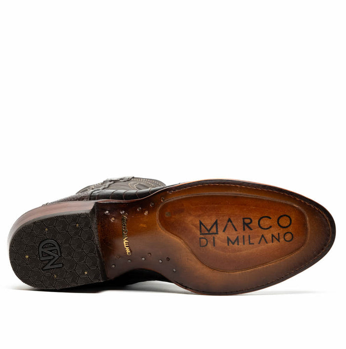 Marco Di Milano Denver cowboy boots. Clear brown ostrich leg leather upper with a round toe. Dark outsole with textured pattern. Smooth interior with brand logo.
