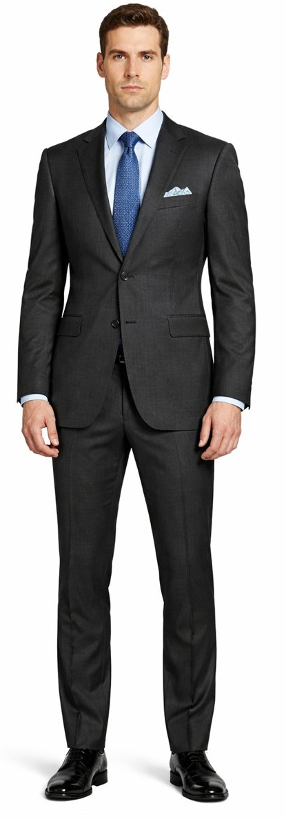 Enzo 150 S dark gray wool suit with two buttons, notched lapels, and tailored trousers. Includes a light blue shirt, blue patterned tie, and pocket square.