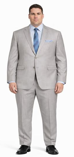 Enzo 150 S Super Wool suit: Light gray, structured 2-button design with flat-front trousers. Smooth wool fabric. Features include notch lapel, two front pockets. Paired with light blue shirt & patterned tie.