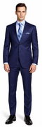 Enzo 150 S Super Wool suit: Tailored fit, navy, 2-button jacket with structured shoulders & notch lapel. Slim-cut pants. Worn with black shoes.