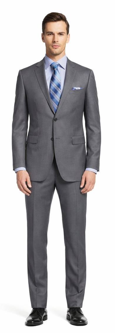 Enzo 150 S Super Wool suit in medium gray. Tailored fit with 2-button jacket (notch lapels, 2 pockets). Flat-front, straight-leg pants.