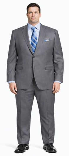 Enzo 150 S Super Wool suit in solid gray. Tailored two-button design with notched lapels and front pockets. Paired with a light blue shirt and striped tie for a professional look. Tapered pants.