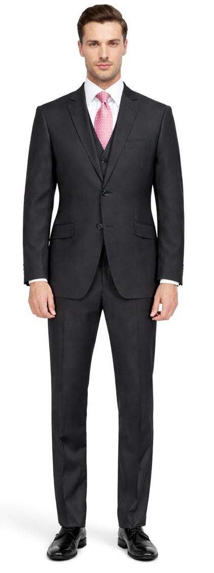 Giorgio Fiorelli charcoal gray two-button suit: Tailored fit, single-breasted, notch lapel. Features charcoal gray exterior, lighter gray lining. Includes matching straight-leg trousers. Smooth, structured fabric.
