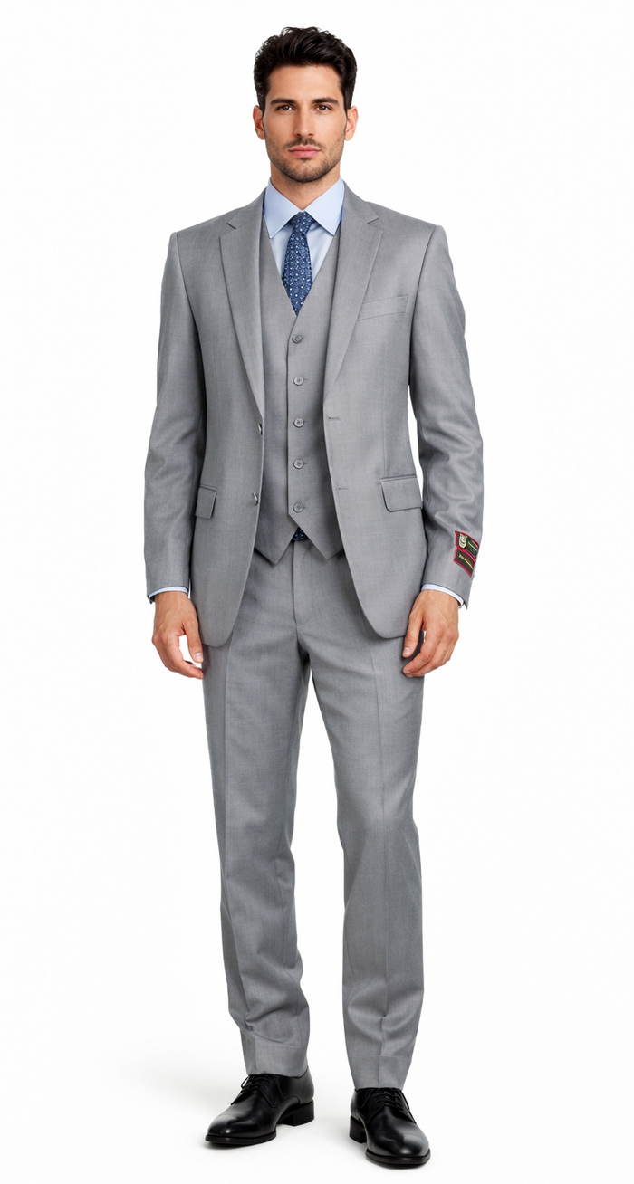 Giorgio Fiorelli grey vest by Albertonardoni. Tailored fit, smooth grey fabric, five buttons, notch collar. Side pockets, plain texture. Worn under matching jacket & pants.
