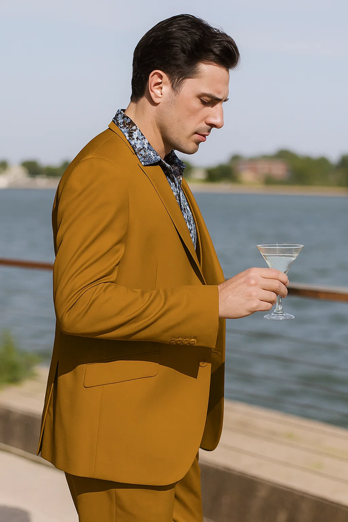 Men's gold suit with double-breasted vest. Features 2-button peak lapel & fitted silhouette. Includes matching vest.