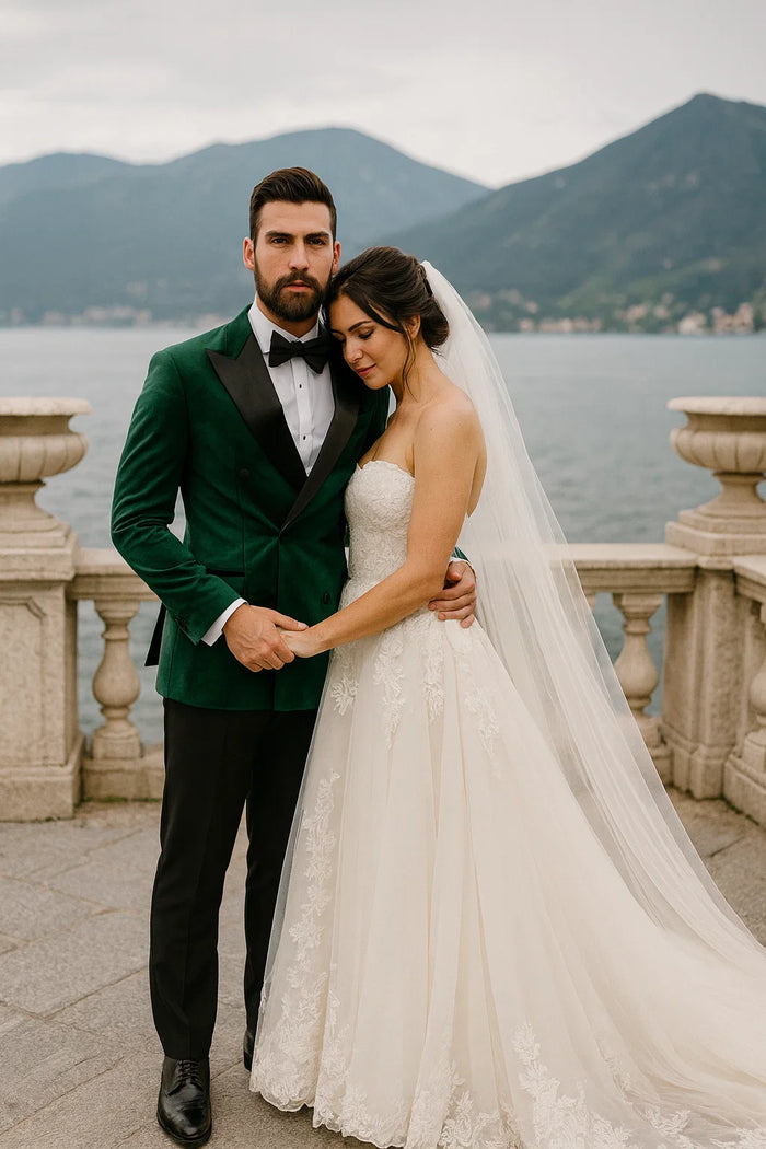 Alberto Nardoni's green velvet double-breasted tuxedo jacket. Tailored fit, structured silhouette, black satin peak lapels. Rich green with sheen, front pockets, classic tuxedo design.
