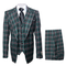 Green plaid wool suit: structured jacket with pointed lapel, 3-button closure, side pockets. Wide-leg pleated pants with relaxed fit. Pink and white accents.