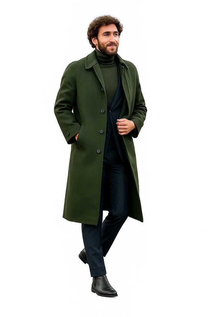 Olive green wool overcoat (knee-length) with notch collar, button closure. Tailored fit, straight shape. Styled with dark pants, ankle boots.
