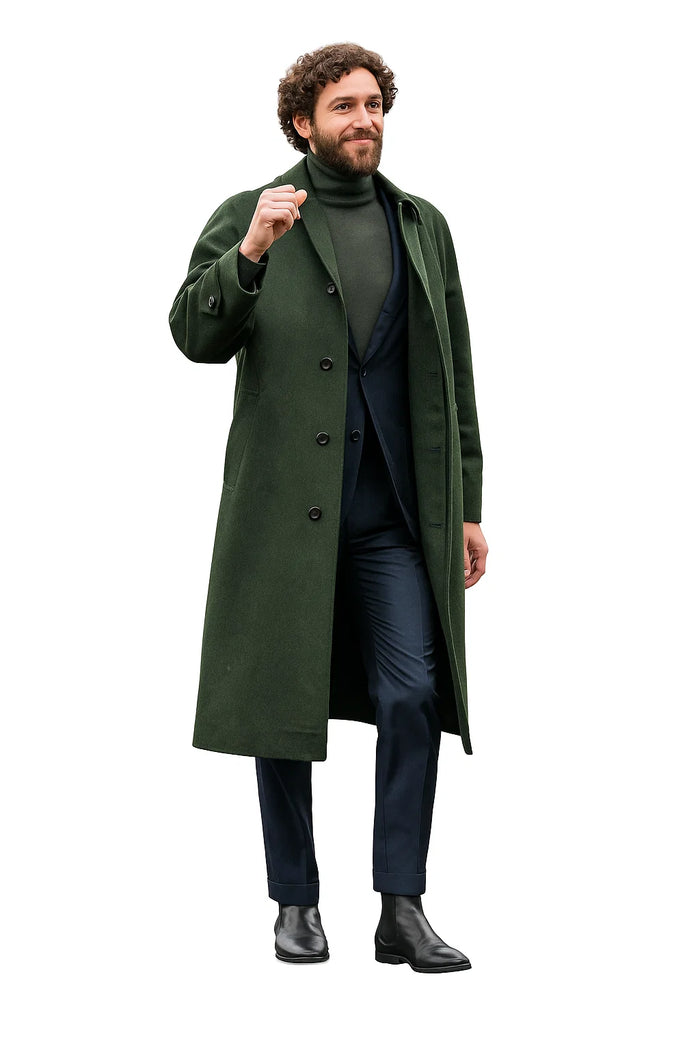 Olive wool overcoat (long, straight) with double-breasted front and notch lapels. Styled with a navy suit and turtleneck.
