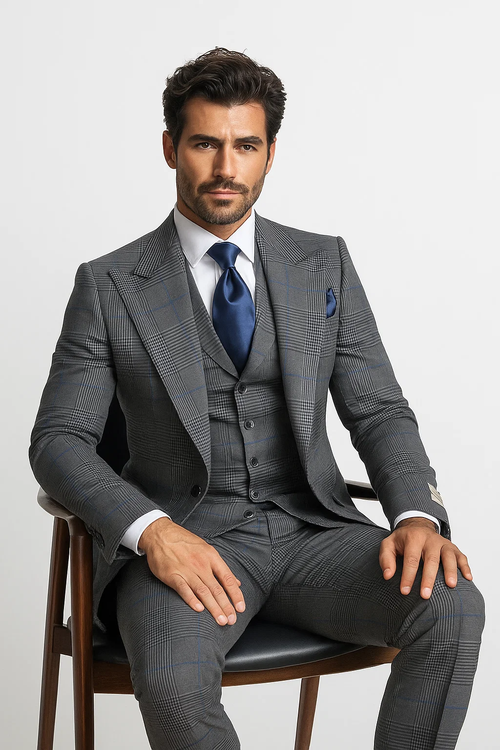 Gray, classic-fit suit in 100% wool with a checkered pattern and blue accents. Includes a tailored jacket and matching pants.