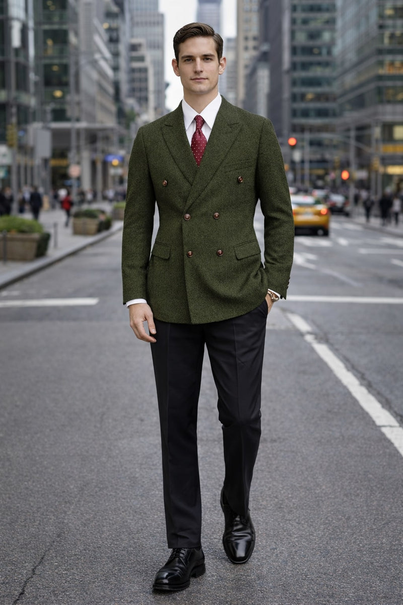 Men's dark green double-breasted winter blazer. Textured fabric, brown buttons, and a modern, structured fit.
