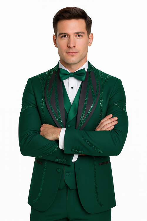 Hunter green Italian wool tuxedo. Modern 3-piece fit. Fitted jacket with black satin shawl collar and subtle shimmer. Matching vest & trousers. Buttoned cuffs, form-fitting silhouette.
