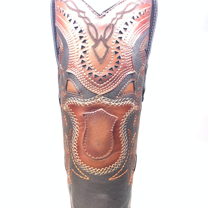Brown Los Altos cowboy boots. Ostrich quill leather, intricate stitching, embossed patterns. Tall, pointed shape with decorative shaft, cutouts, contrasting colors.
