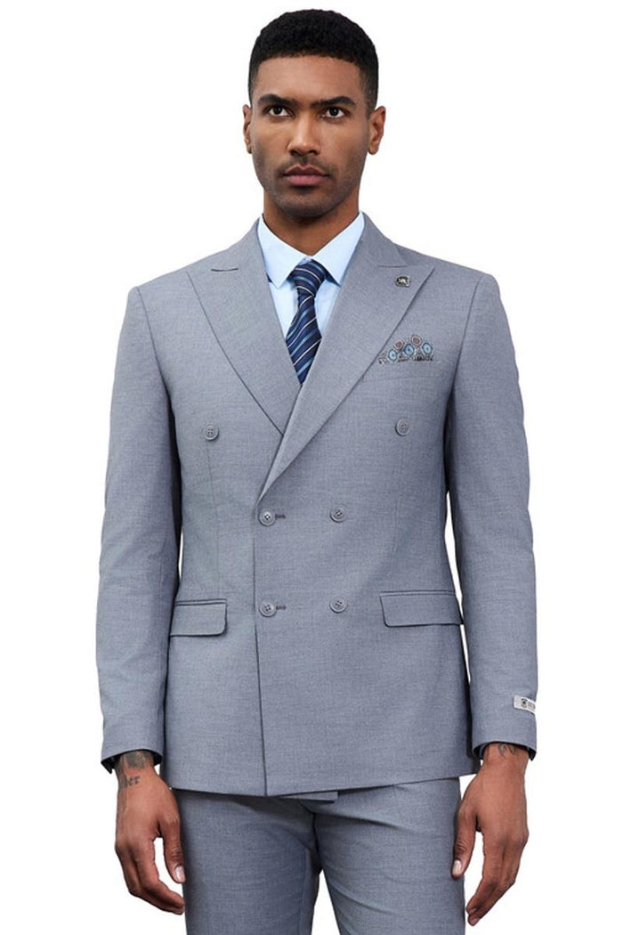 Stacy Adams men's grey double-breasted suit. Tailored fit, structured form, smooth fabric. Features double-breasted front, notch lapels, chest pocket with patterned pocket square, and matching trousers.
