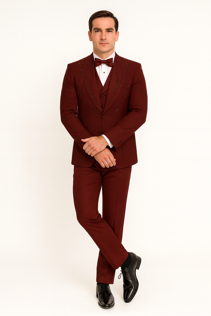 Men's burgundy Italian wool tuxedo: modern 3-piece suit. Fitted jacket with shawl collar, matching vest, tailored trousers. Smooth, subtly shiny fabric, decorative stitching. Black bow tie, shoes complete the look.
