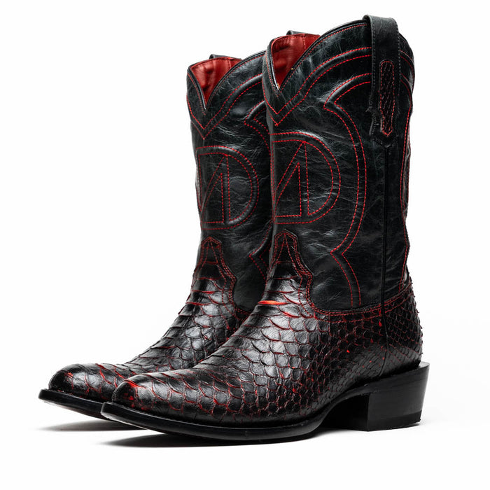 Marco Di Milano Kansas cowboy boots. Black & red python skin. Round toe, elevated heel. Glossy texture, decorative red stitching. Contrasting red interior, pull tabs.
