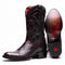 Marco Di Milano Kansas boots: black and dark red python skin. Tall shaft with decorative stitching. Round toe. Smooth sole with visible branding.
