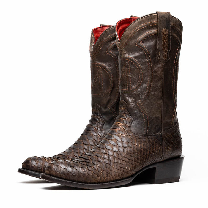 Marco Di Milano Kansas brown python cowboy boots. Round toe, brown python leather upper with scales. Detailed shaft stitching. Pull tabs. Stacked heel. Red interior lining.
