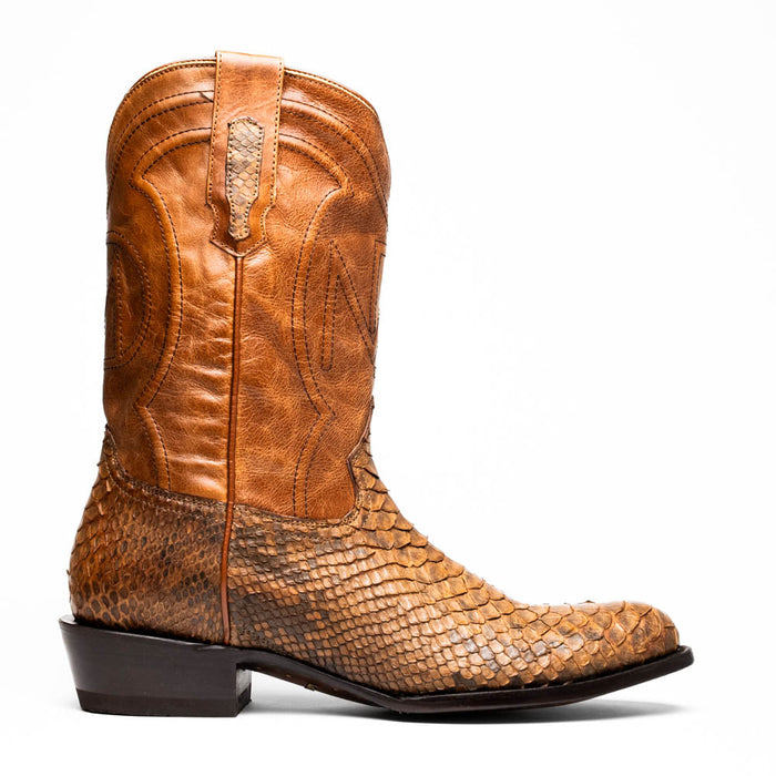 Marco Di Milano Kansas Cognac Cowboy Boots: Round toe, tall silhouette. Upper: light cognac leather. Lower: darker, scaled design. Decorative stitching. Moderate stacked heel. Distinctive snake-skin pattern.

