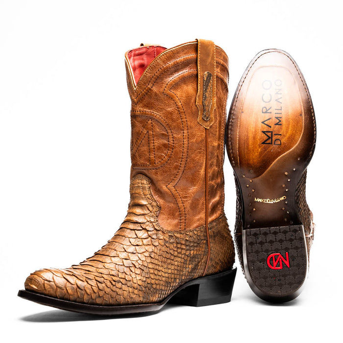Marco Di Milano Kansas cognac cowboy boots in tan leather. Round toe, scale-like texture, decorative stitching, and red lining. Branded sole with tread design.
