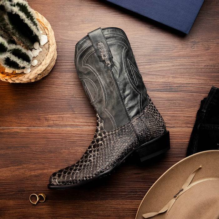 Marco Di Milano Kansas Stone cowboy boots in white. Tall shaft, smooth black leather upper, embossed snakeskin panel. Black & gray, white stitching. Round toe, stacked heel, pull strap.
