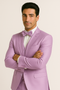 Alberto Nardoni's lavender majesty tuxedo. 4-piece set: fitted blazer with peak lapels, matching trousers, bow tie, and waistcoat. Smooth, light lavender fabric. Straight-cut trousers. Waistcoat with V-neck. Formal elegance.