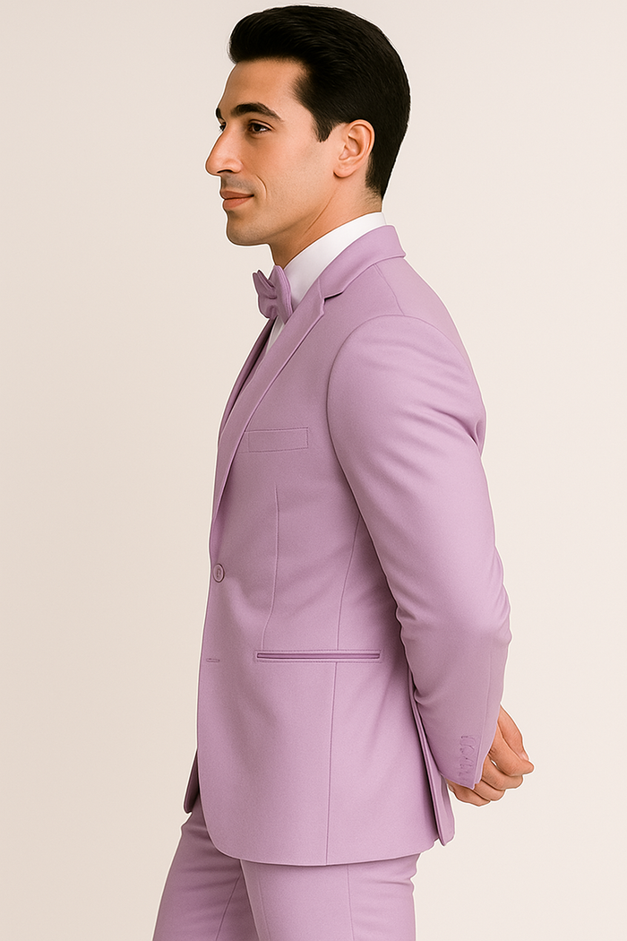 Alberto Nardoni's Lavender Majesty tuxedo: fitted jacket with peaked lapels, single button, tailored pants, and matching bow tie. Smooth fabric for a formal, elegant look.
