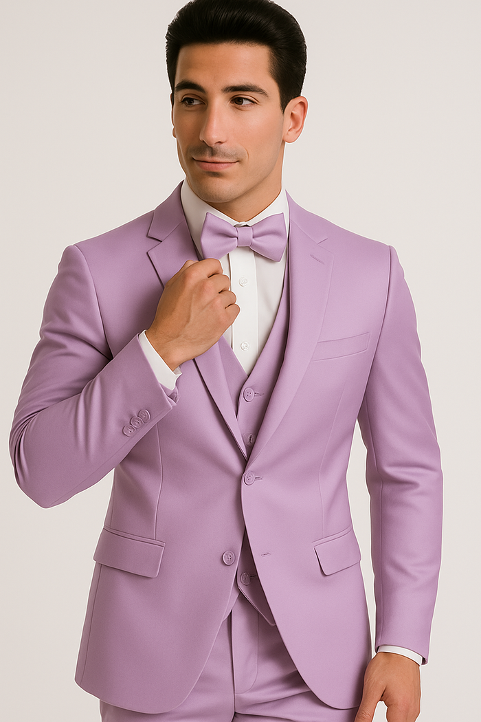 Lavender tuxedo set: single-breasted jacket, matching vest & pants. Soft, lavender fabric (polyester blend), white shirt, bow tie. Fitted, structured silhouette with pockets and sleek buttons.
