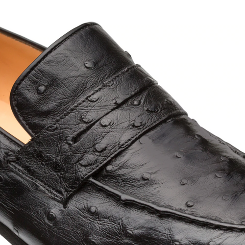 Black Mezlan Lisbon penny loafers, crafted from textured ostrich quill leather. Classic design with a penny strap, contrasting interior lining, and a flat, subtly shiny sole.
