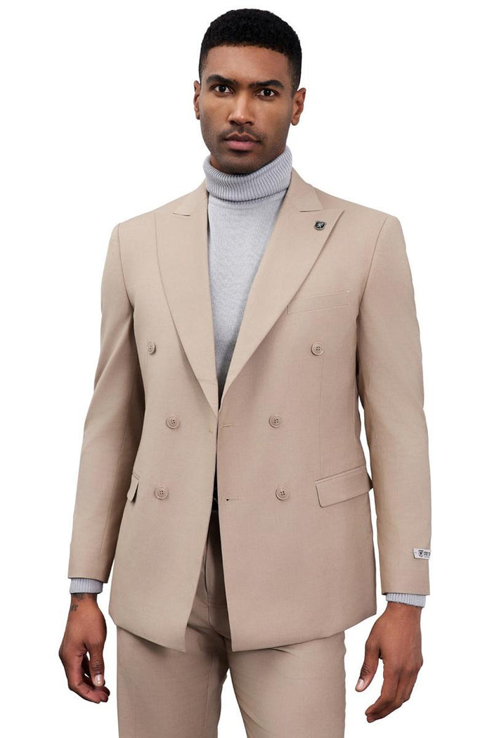Stacy Adams tan double-breasted suit: structured, tailored fit, broad lapels. Solid tan, smooth fabric, six buttons. Features: chest/flap pockets, buttoned cuffs, tailored trousers. Formal design.
