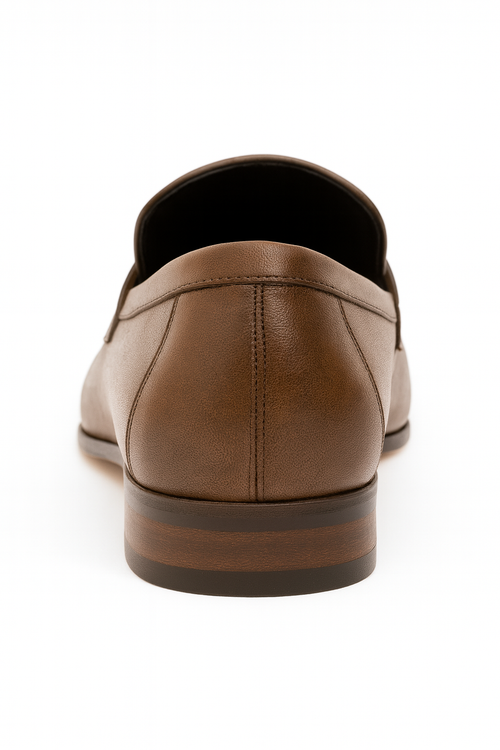Men's brown slip-on shoes. Smooth brown leather upper, rounded toe. Slight heel with a wooden accent. Lined interior for a seamless, regal design.
