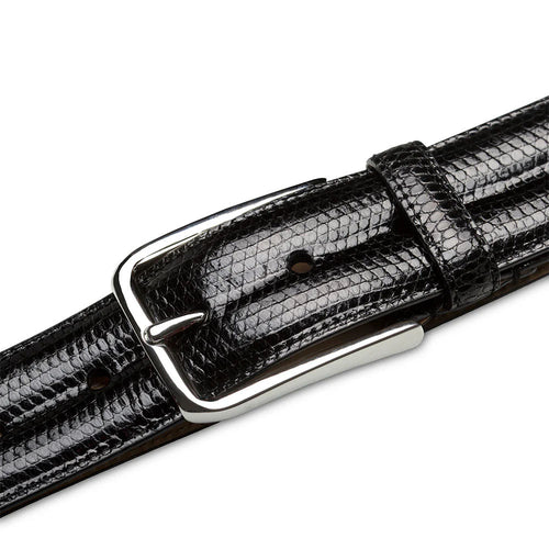 Black Mezlan lizard belt. Leather with textured lizard skin pattern. Shiny silver-tone buckle. Multiple holes for size adjustment. Classic design.
