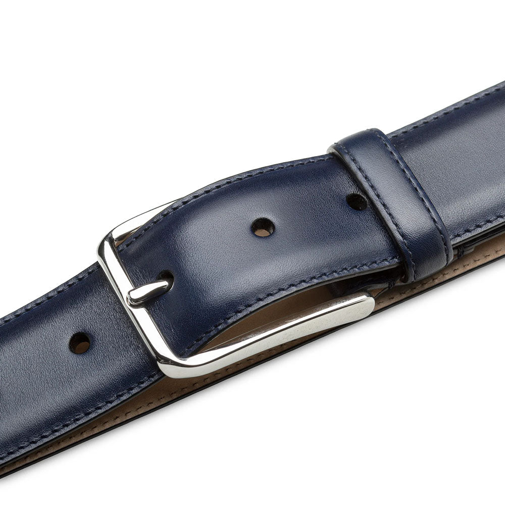Blue Mezlan calfskin belt with a smooth, subtly shiny surface and silver buckle. Features piped edges for a defined shape. Multiple adjustment holes.
