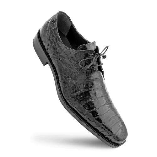 Mezlan Anderson black crocodile derby shoes. Sleek silhouette, rounded toe, low profile. Crocodile leather upper with distinctive scales. Leather sole with slight curve. Traditional lace-up design.
