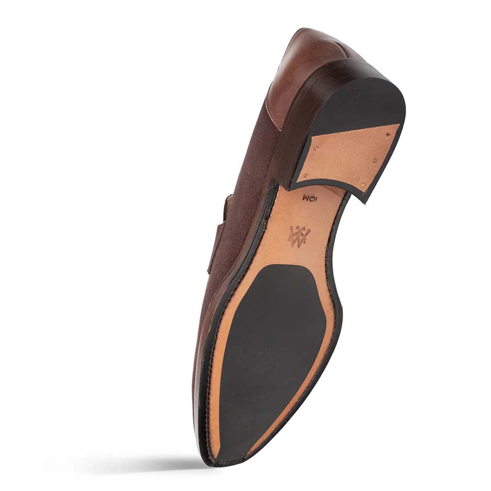 Brown Mezlan Galeno suede penny loafer. Low-profile silhouette, rounded toe, penny slot. Brown suede upper, tan leather midsole, black rubber outsole. Smooth transition, visible stitching.
