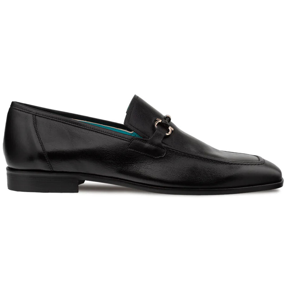 Mezlan Rios Flex Loafer in black: sleek, low-profile design with pointed toe. Smooth black leather, metal ornament detail. Flexible construction, slender heel, contrasting interior lining.
