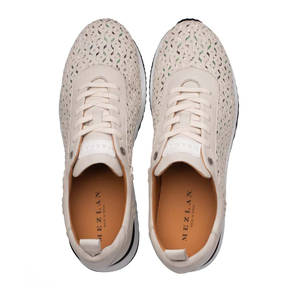 Mezlan Plata sneaker: Light green laser-cut design. Soft leather upper, dark sole, white laces. Streamlined shape with rounded toe and secure heel fit. Tan interior lining.
