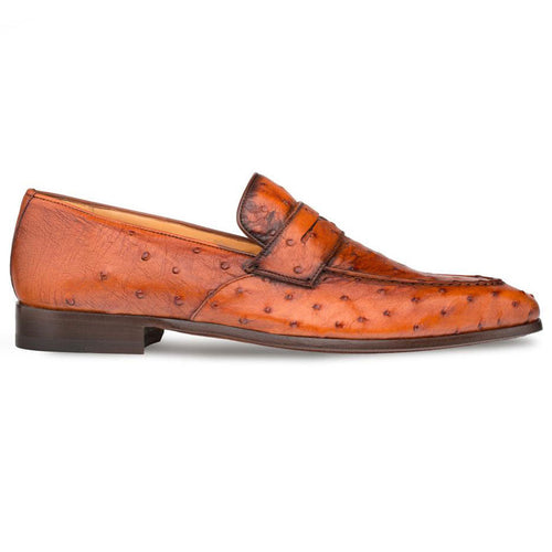 Mezlan Lisbon penny loafers in brandy ostrich quill. Slip-on, rounded toe design with a textured upper and a strap detail. Dark brown leather outsole.
