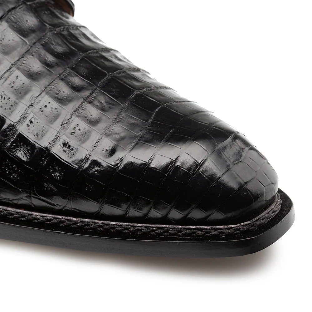Mezlan Dandy Alligator lace-up in black. Pointed toe, textured alligator pattern, glossy finish. Thin black sole with stitched edge.
