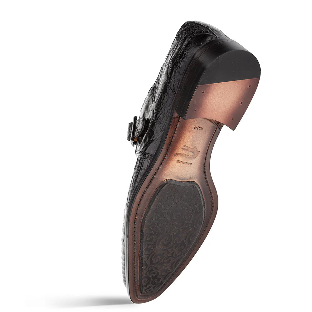 Mezlan Gigolo Monk Strap: Black crocodile leather with textured pattern. Single metal buckle. Low stacked heel. Leather sole with decorative design.
