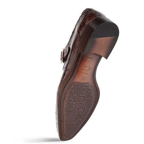 Mezlan Gigolo monk strap in brown crocodile leather. Sleek design with textured pattern. Polished sole with detailed design and slightly elevated heel.
