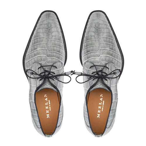 Mezlan Cratos Derby: Pointed toe, 2-eyelet lace-up. Pearl grey crocodile leather upper, tan lining. Slim black rubber sole.