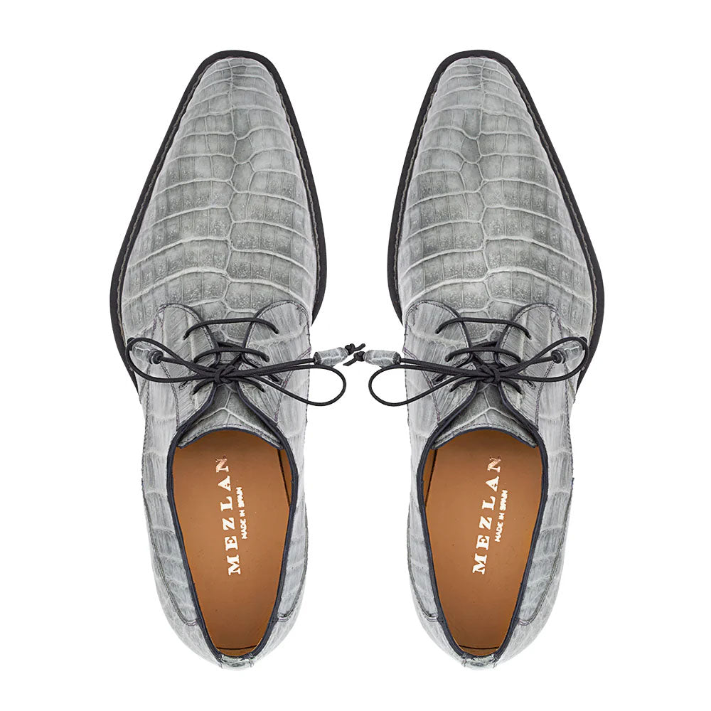 Mezlan Cratos Derby: Pointed toe, 2-eyelet lace-up. Pearl grey crocodile leather upper, tan lining. Slim black rubber sole.