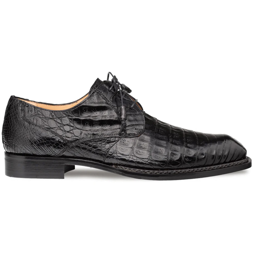 Mezlan Cratos derby in black crocodile leather. Streamlined silhouette, pointed toe, textured pattern. Lace-up closure, slim ankle height, flat stacked heel, single-stitch sole detail.
