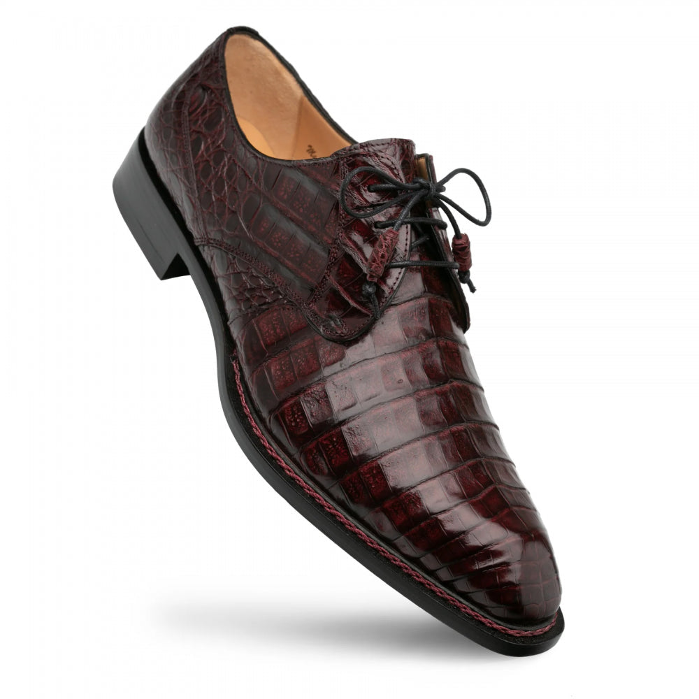 Burgundy Mezlan Cratos Derby with crocodile leather upper, pointed toe, and lace-up closure. Features textured scales and a contrasting, sturdy sole with a slight shine.
