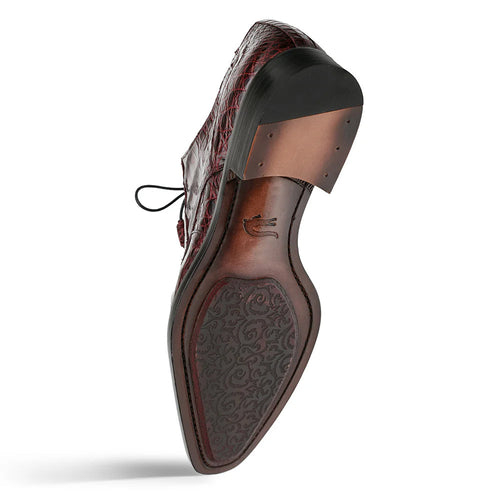 Burgundy Mezlan Cratos Derby features crocodile-textured upper, leather sole with patterned tread, and a slightly raised heel. Decorative laces and rich color unify the design.

