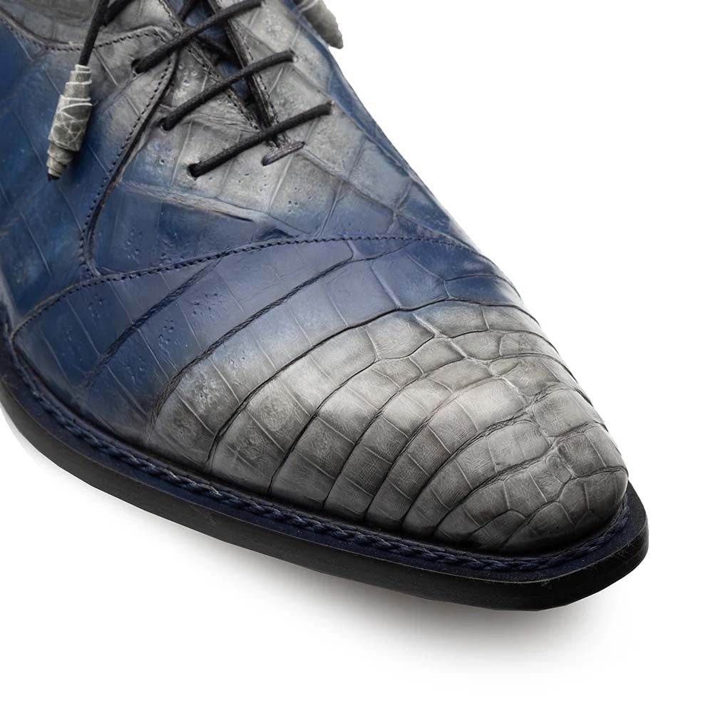 Mezlan Pueblo Oxford: Pearl grey & blue crocodile leather, two-tone finish. Pointed toe, textured scale pattern. Grey toe, blue midfoot. Black laces & sole. Sleek silhouette.
